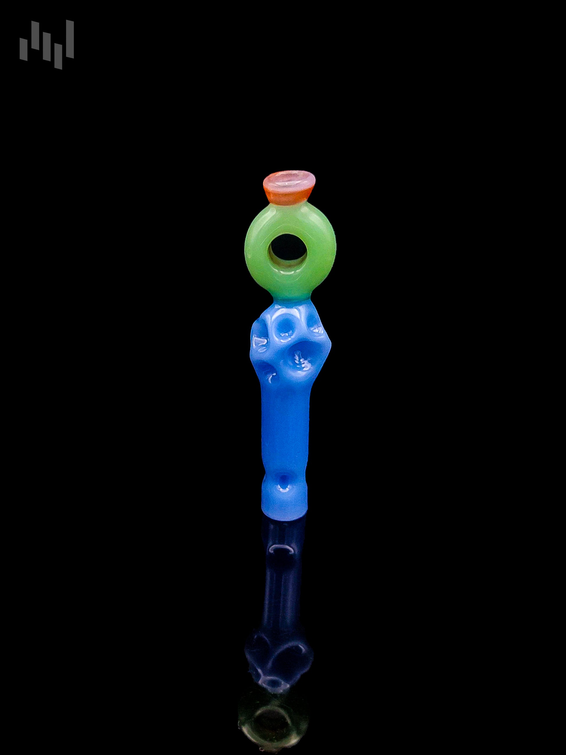 Image of the tinymight stem by Napglass with blue and green color, dimpled bottom, doughnut shaped top, and a red mouthpiece on the tip