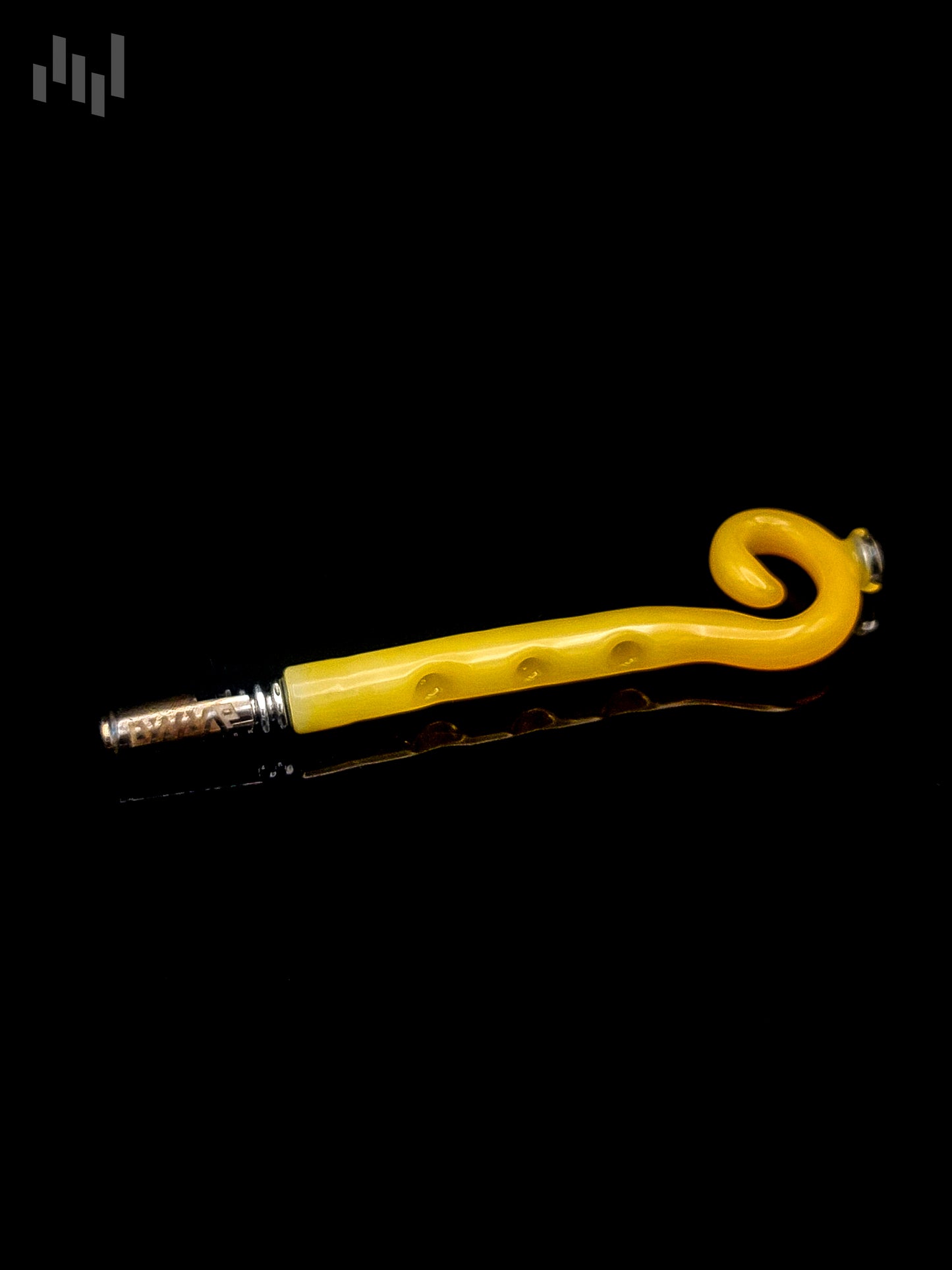 Image of the dynavap stem by Napglass, golden color with swirls, tentacle like in appearance